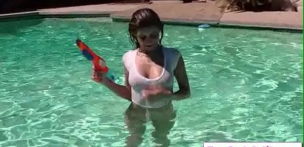  Sexy big tit teen Nina North lays with a water gun toy and show her nice tight ass and perky boobs